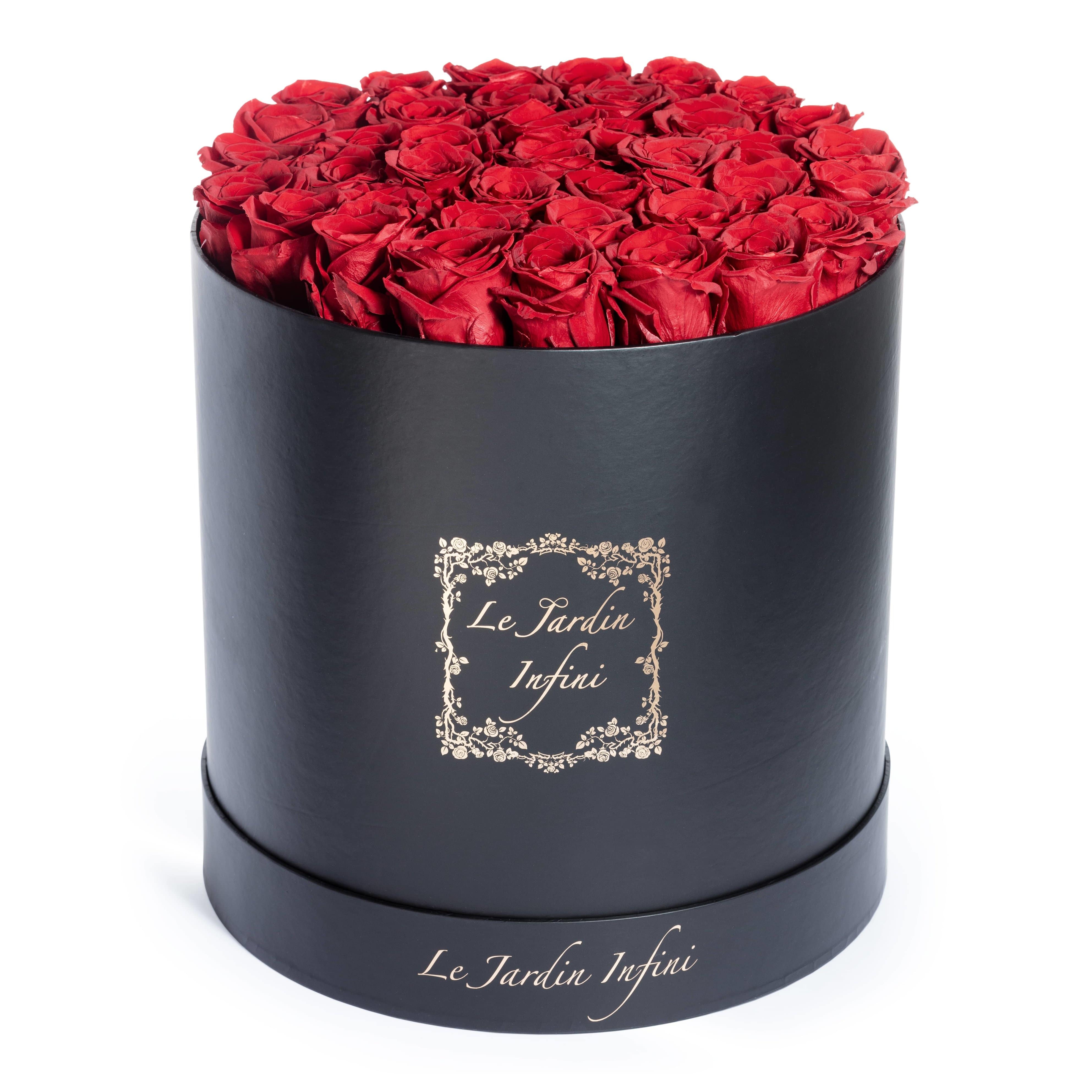 Small Round Black Hat Box with Half Dozen Red Everlasting Preserved Roses | The Only Roses